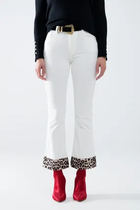 Cream Corduroy flare pants with leopard print at the bottom